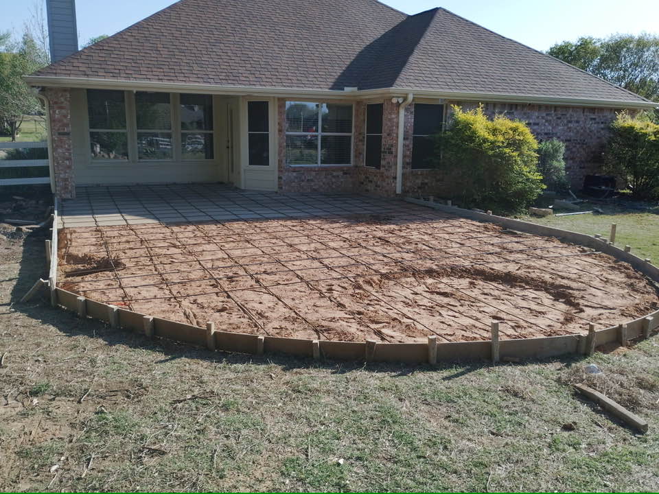 Rebar grid laid out for the new rounded concrete patio slab